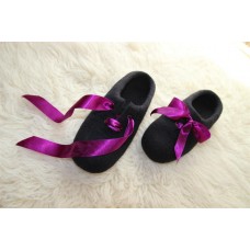 Black slippers with elegant violet ribbon